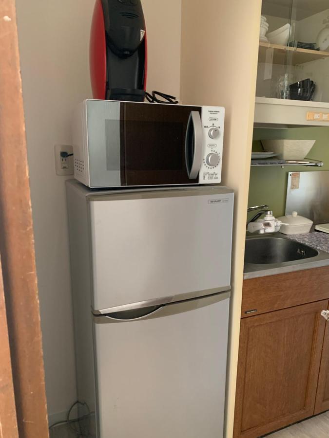 Apartamento ウィンベル沖縄名護コーラルビュー Agarii Exterior foto