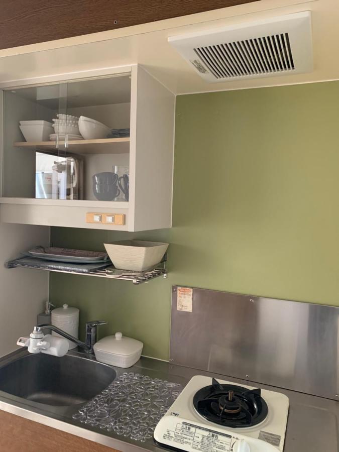 Apartamento ウィンベル沖縄名護コーラルビュー Agarii Exterior foto