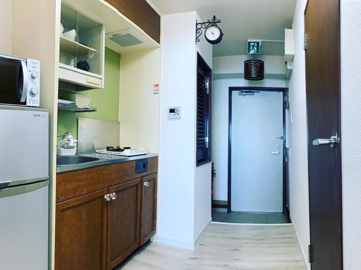 Apartamento ウィンベル沖縄名護コーラルビュー Agarii Exterior foto